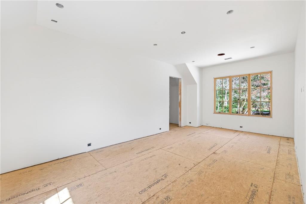 312 Blackland Road Northwest Atlanta, GA 30342 - Photo 34 of 58 a view of an empty room with a window