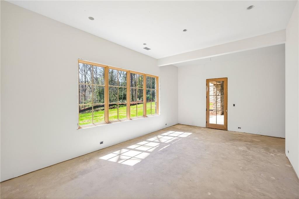 312 Blackland Road Northwest Atlanta, GA 30342 - Photo 46 of 58 a view of an empty room with a window