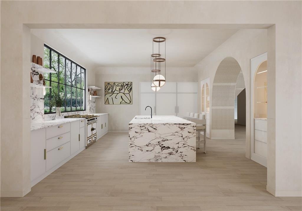 312 Blackland Road Northwest Atlanta, GA 30342 - Photo 10 of 58 a spacious bathroom with a double vanity sink a mirror and a bathtub