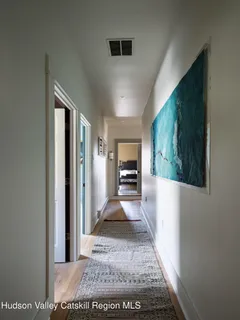 a room with furniture and a window