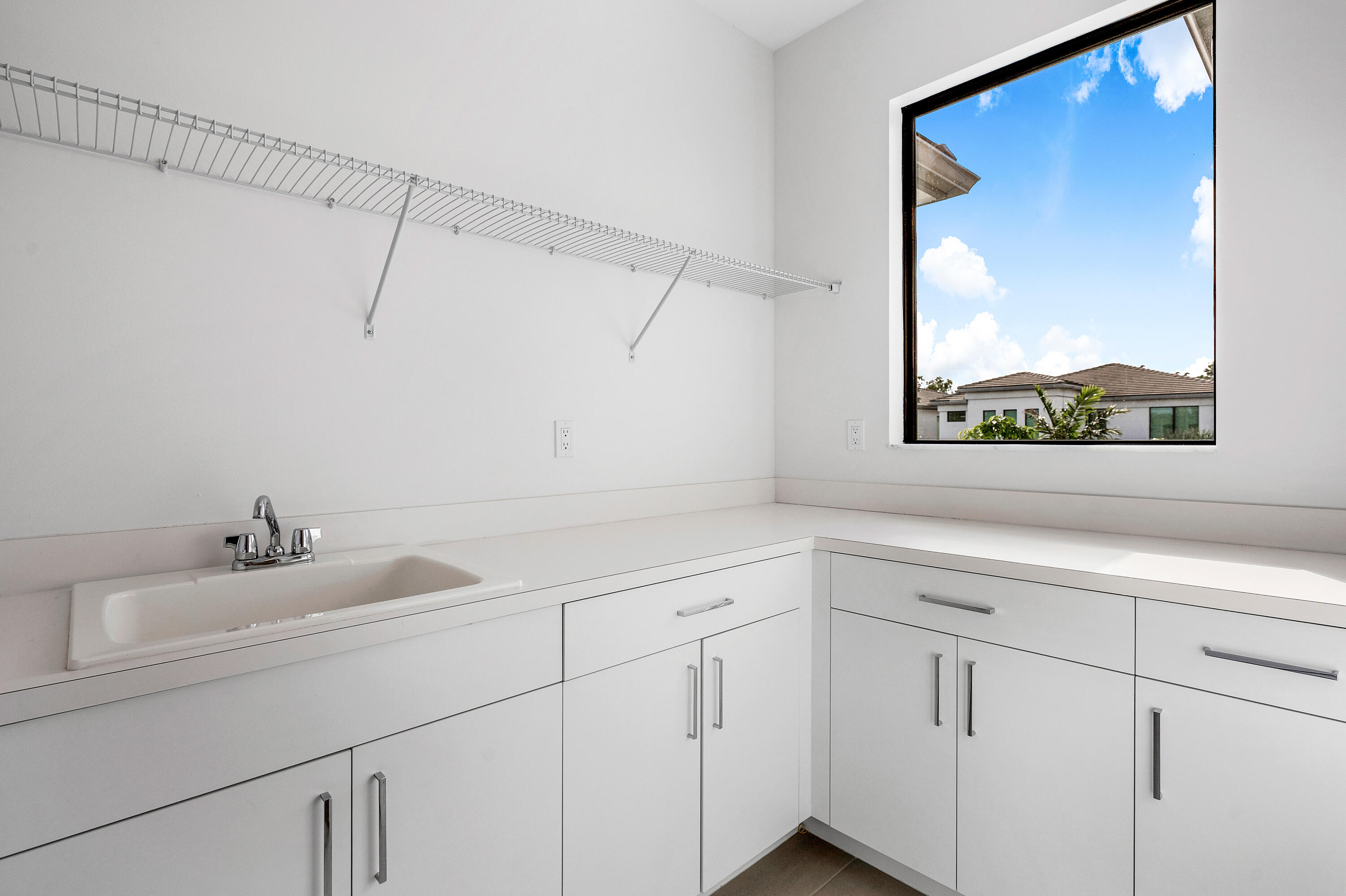 17528 Rainstream Road Boca Raton, FL 33496 - Photo 19 of 51 2nd Floor Laundry Room with Sink