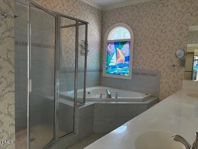 a view of a room with a fan and window