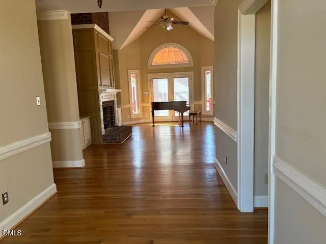 a view of livingroom with hardwood floor and a ceiling fan