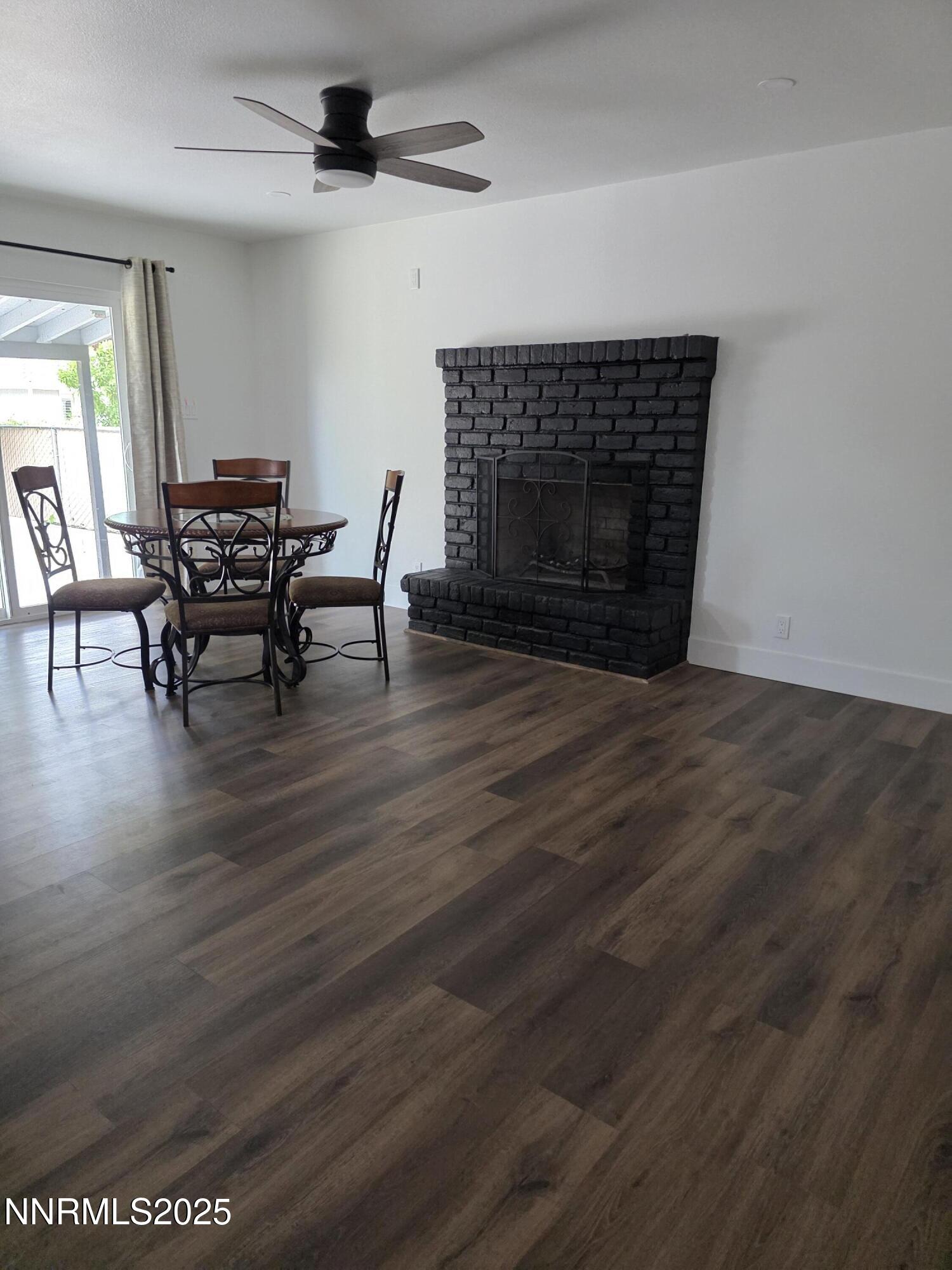 3280 Everett Drive Reno, NV 89503 - Photo 4 of 9 a living room with furniture and a fireplace