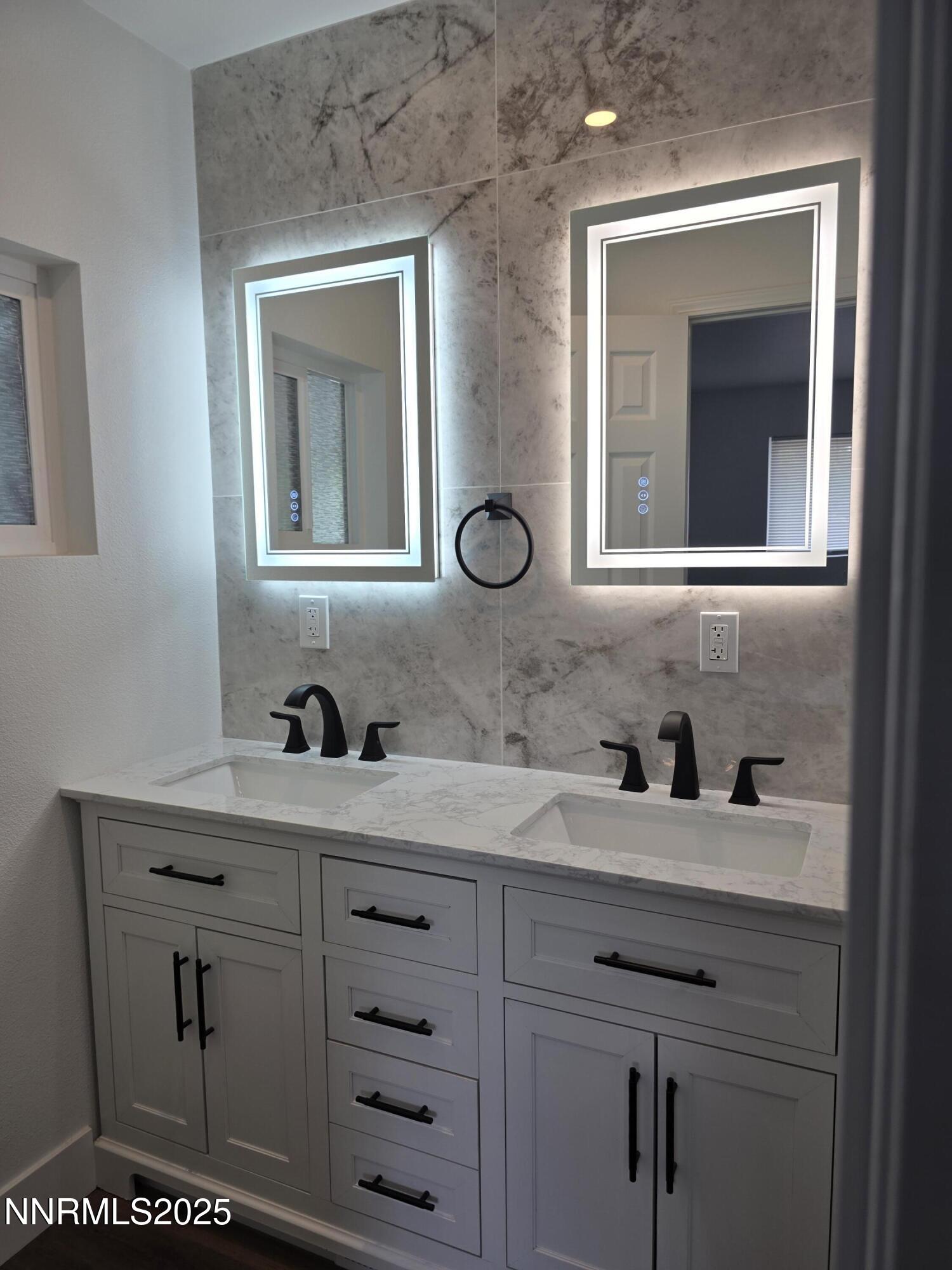 3280 Everett Drive Reno, NV 89503 - Photo 9 of 9 a bathroom with a toilet sink and mirror
