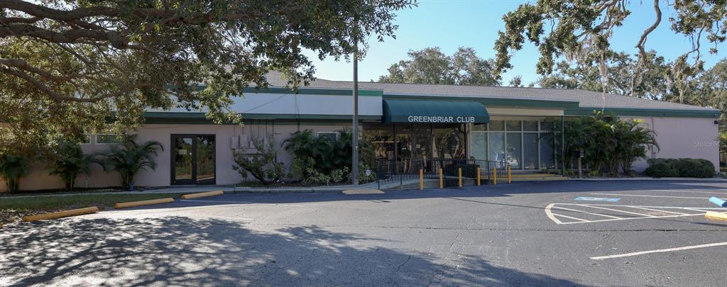 2003 Greenbriar Boulevard, Unit 1 Clearwater, FL 33763 - Photo 17 of 20 a front view of a house with garden