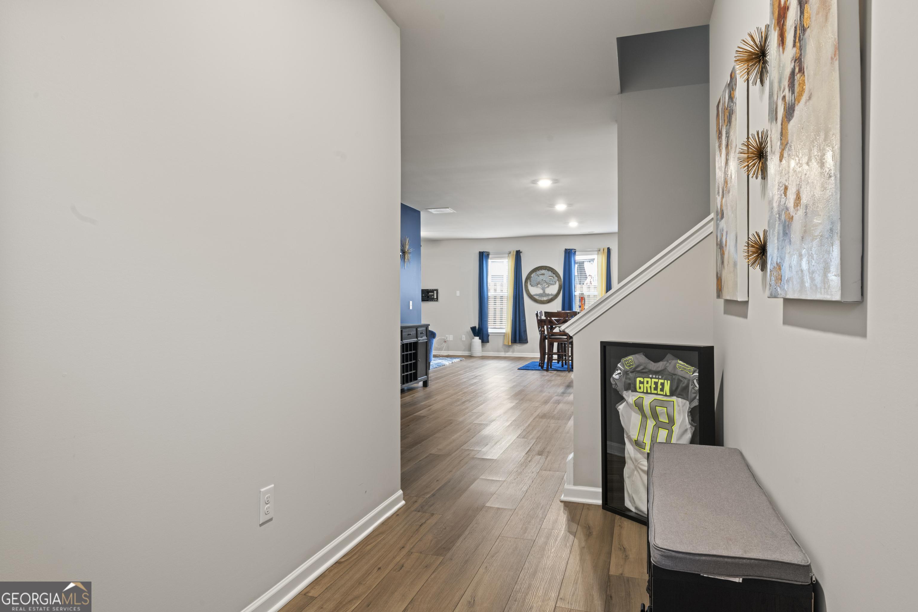 11940 Brightside Parkway Hampton, GA 30228 - Photo 6 of 29 a view of entryway and hall with wooden floor