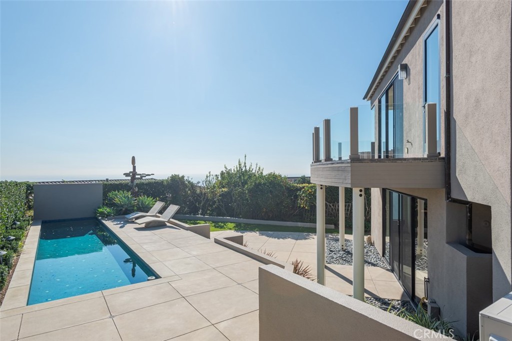810 Emerald Bay Laguna Beach, CA 92651 - Photo 16 of 28 a balcony with view of car parked