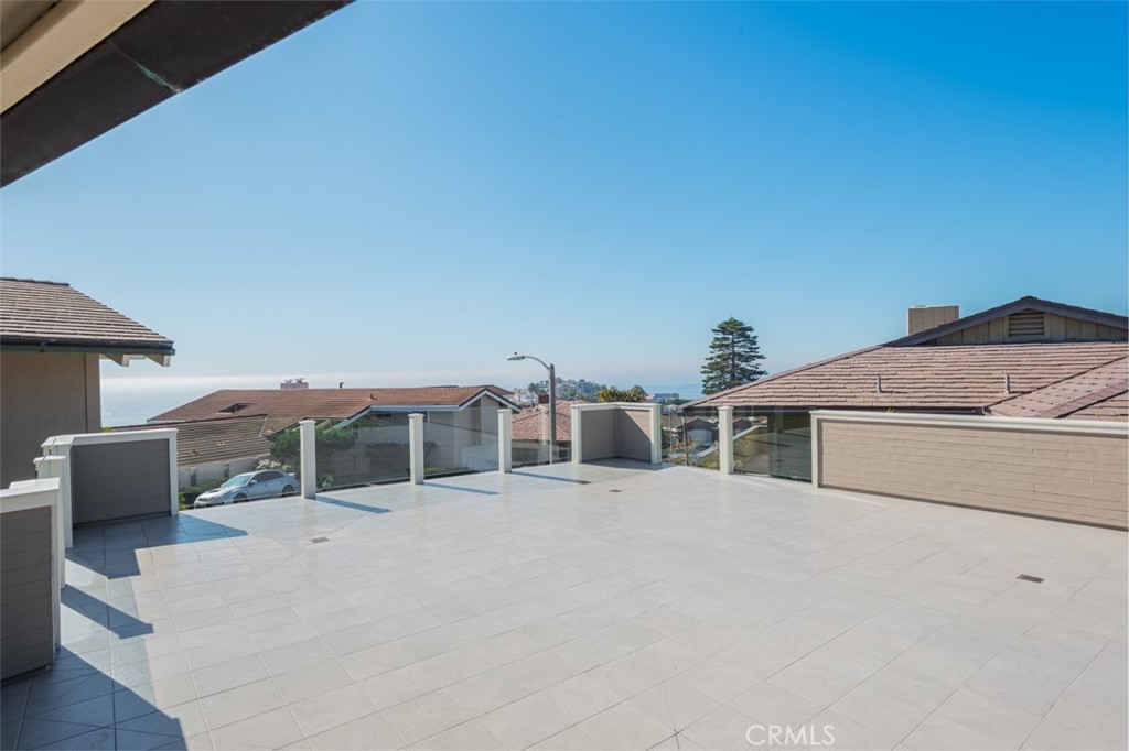 810 Emerald Bay Laguna Beach, CA 92651 - Photo 19 of 28 a view of a house with a terrace