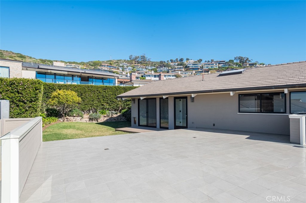 810 Emerald Bay Laguna Beach, CA 92651 - Photo 20 of 28 a front view of a house with a yard