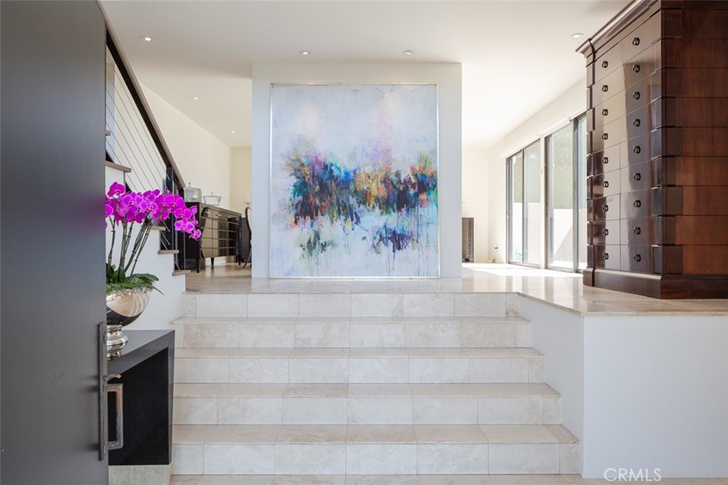 810 Emerald Bay Laguna Beach, CA 92651 - Photo 2 of 28 a view of staircase with a potted plant