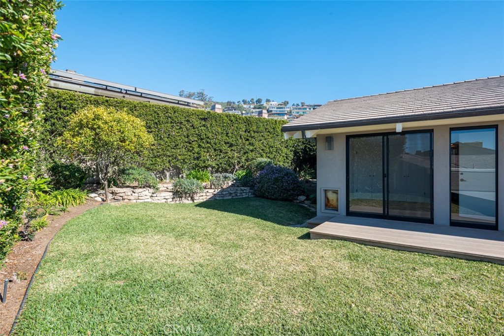 810 Emerald Bay Laguna Beach, CA 92651 - Photo 22 of 28 front view of a house with a yard