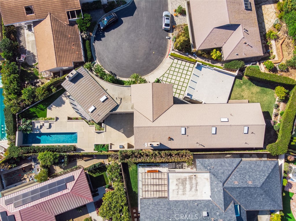 810 Emerald Bay Laguna Beach, CA 92651 - Photo 25 of 28 an aerial view of a house with a yard and a large tree