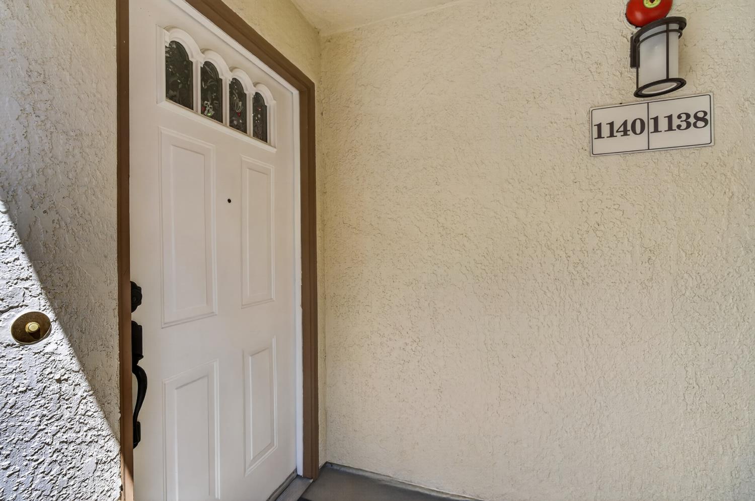 8020 Walerga Road, Unit 1140 Antelope, CA 95843 - Photo 5 of 37 a view of a hallway with wooden door