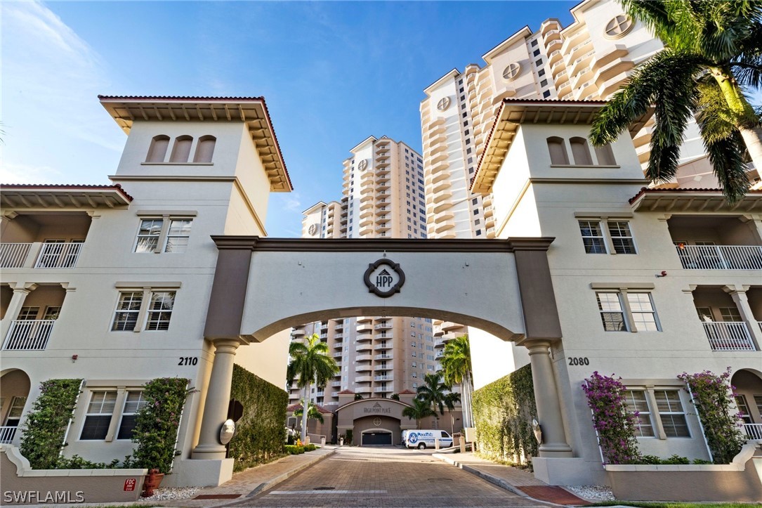 2104 West First Street, Unit 1404 Fort Myers, FL 33901 - Photo 1 of 30 a view of a building with a balcony