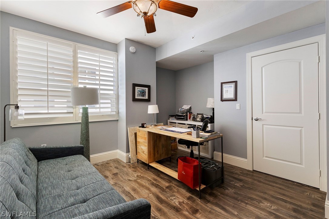 2104 West First Street, Unit 1404 Fort Myers, FL 33901 - Photo 26 of 30 a view of a livingroom with workspace and a window