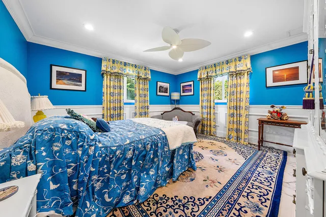 a view of a garden with large trees