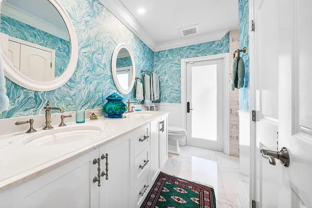 a view of a house with a backyard porch and sitting area