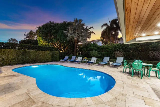 a picture of a house with a garden