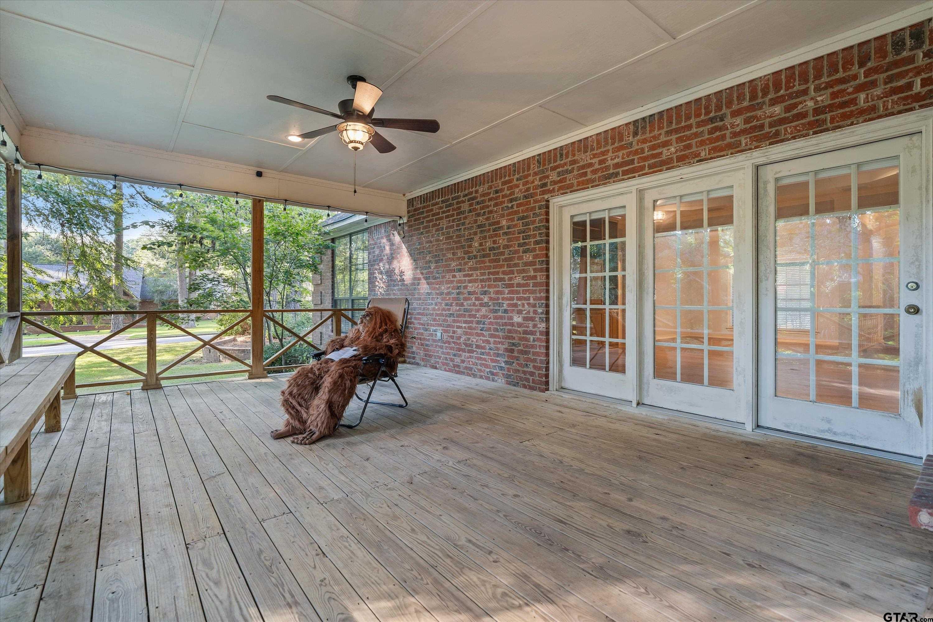 9211 Elm Tree Circle Tyler, TX 75703 - Photo 21 of 31 a view of a livingroom with furniture and wooden floor