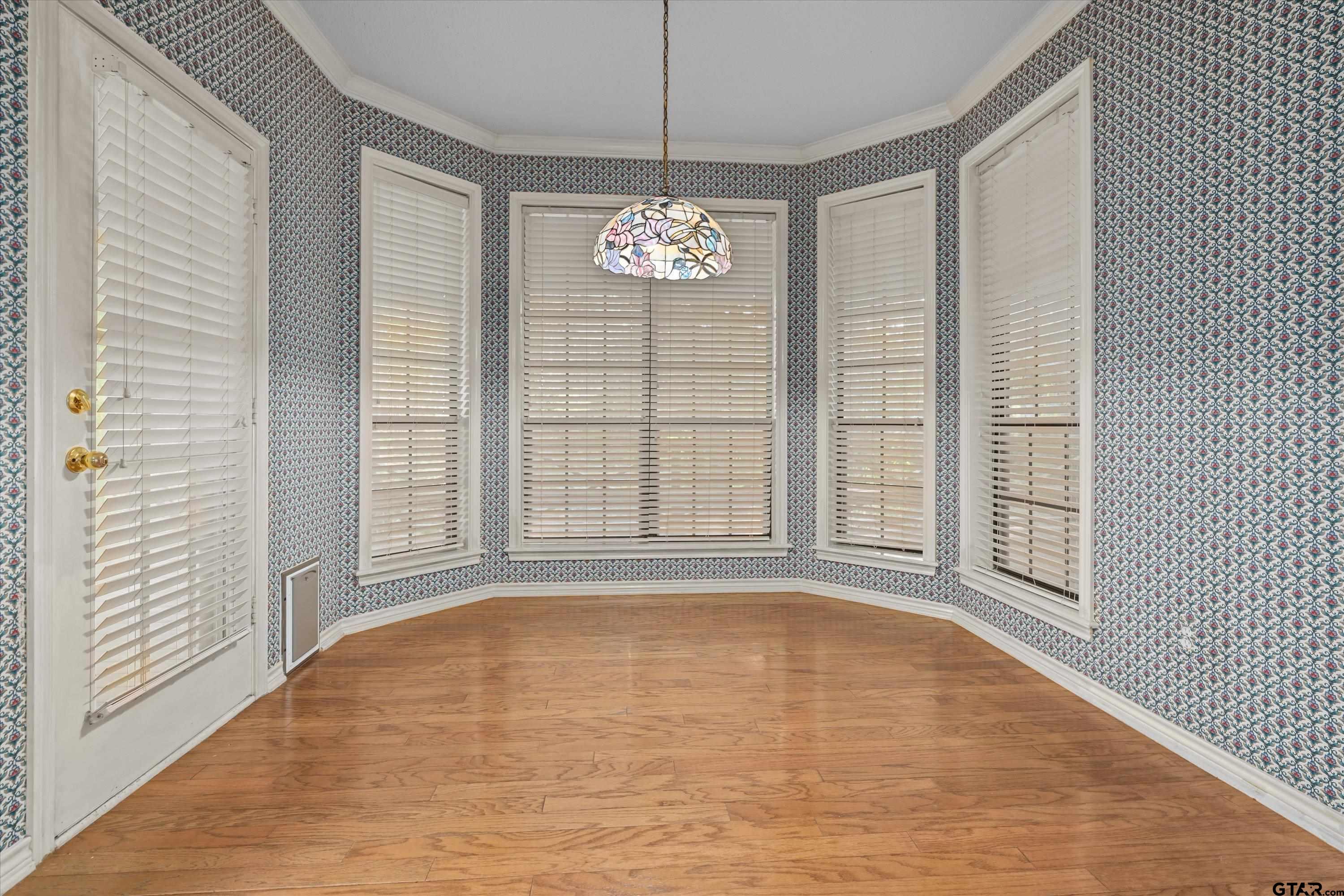 9211 Elm Tree Circle Tyler, TX 75703 - Photo 5 of 31 a view of an empty room with a window