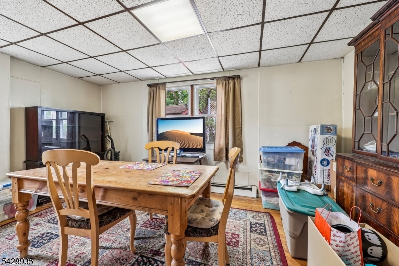 50 Preston Street Ridgefield Park, NJ 07660 - Photo 11 of 41 a view of a dining room with furniture window and wooden floor