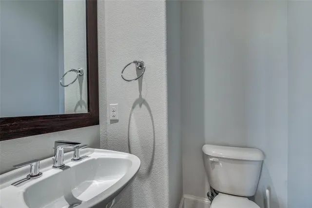 a bathroom with a sink and a toilet