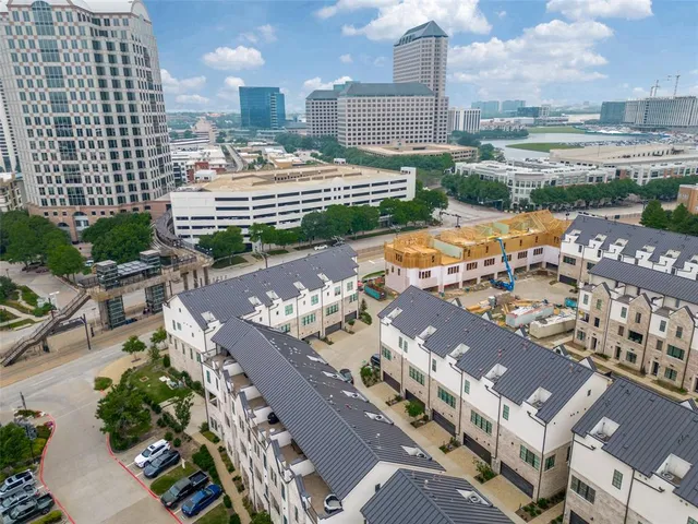 a view of city with tall buildings