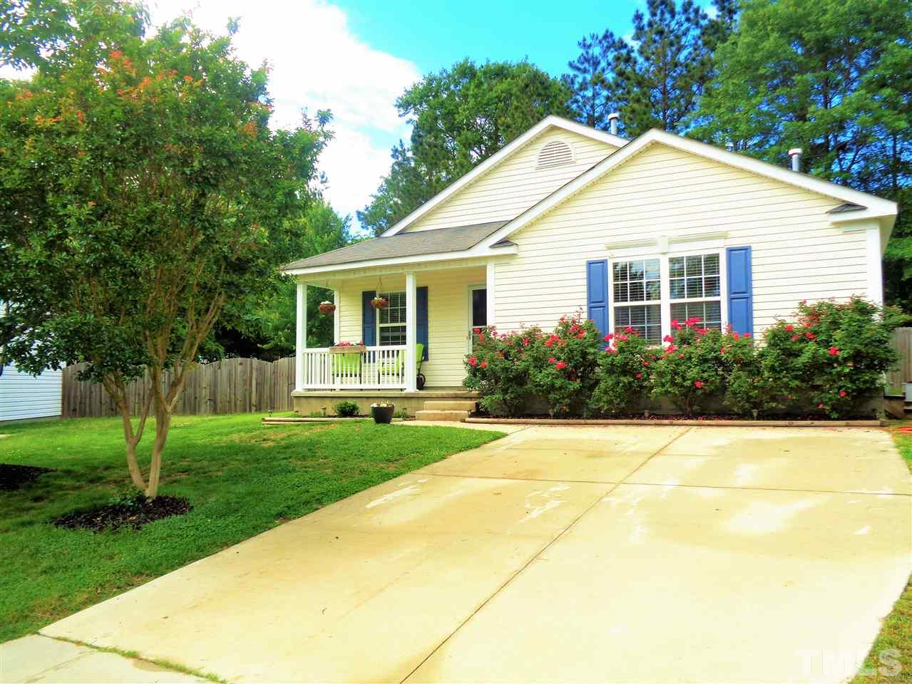 5304 Graymar Court Raleigh, NC 27616 - Photo 1 of 25 a view of a house with a yard and plants