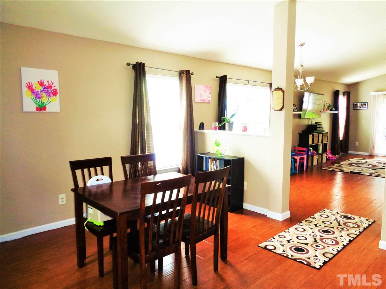 5304 Graymar Court Raleigh, NC 27616 - Photo 3 of 25 a view of a dining room with furniture and a window