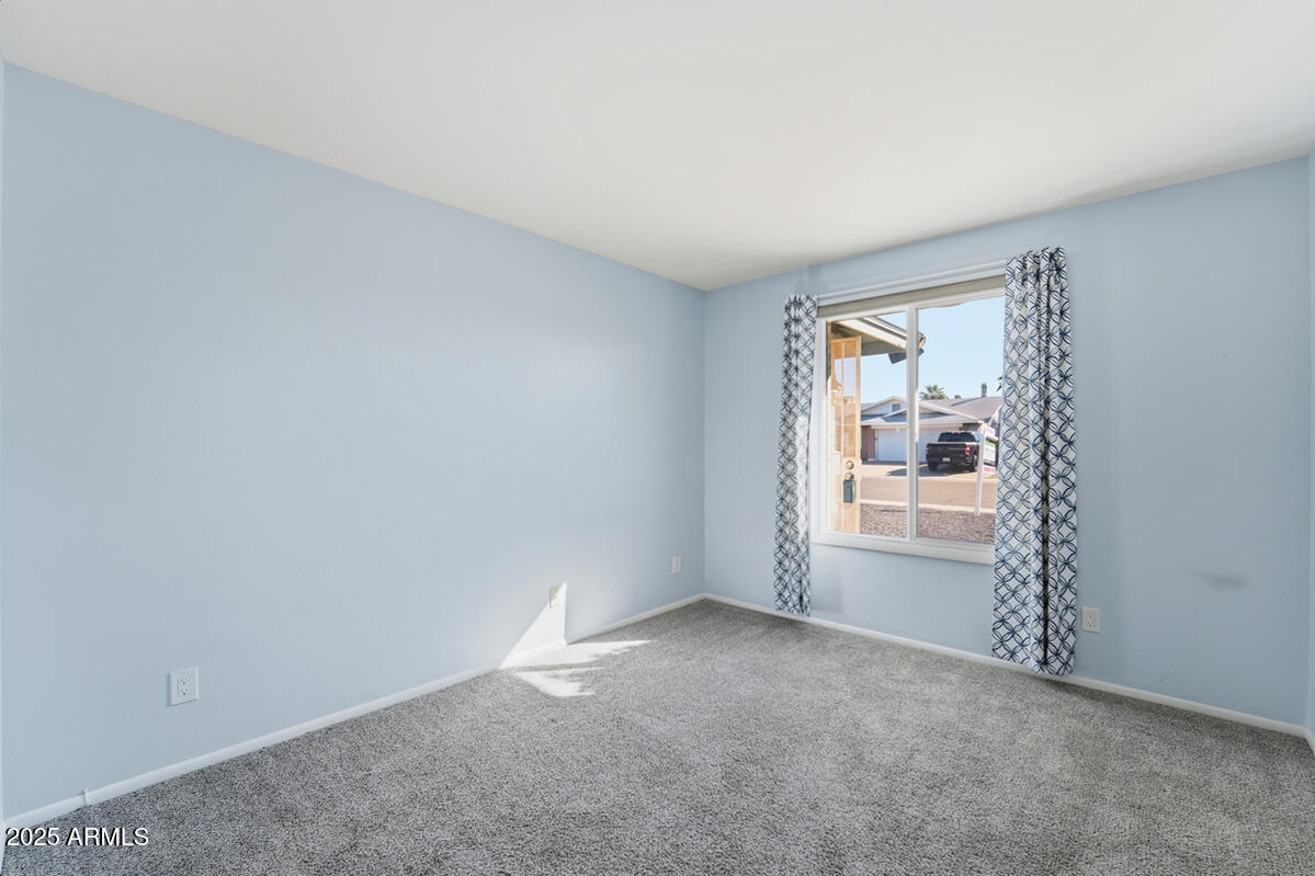 1644 East Broadmor Drive Tempe, AZ 85282 - Photo 16 of 49 an empty room with a window