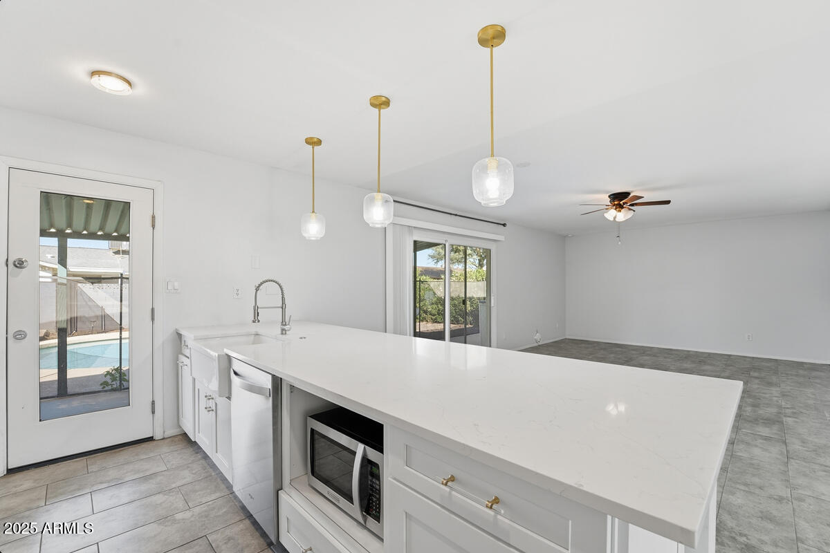 1644 East Broadmor Drive Tempe, AZ 85282 - Photo 20 of 49 a view of a kitchen with electric appliances