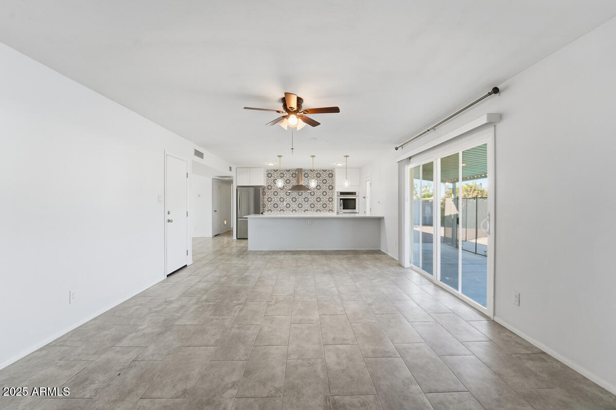 1644 East Broadmor Drive Tempe, AZ 85282 - Photo 24 of 49 a view of an empty room with a window