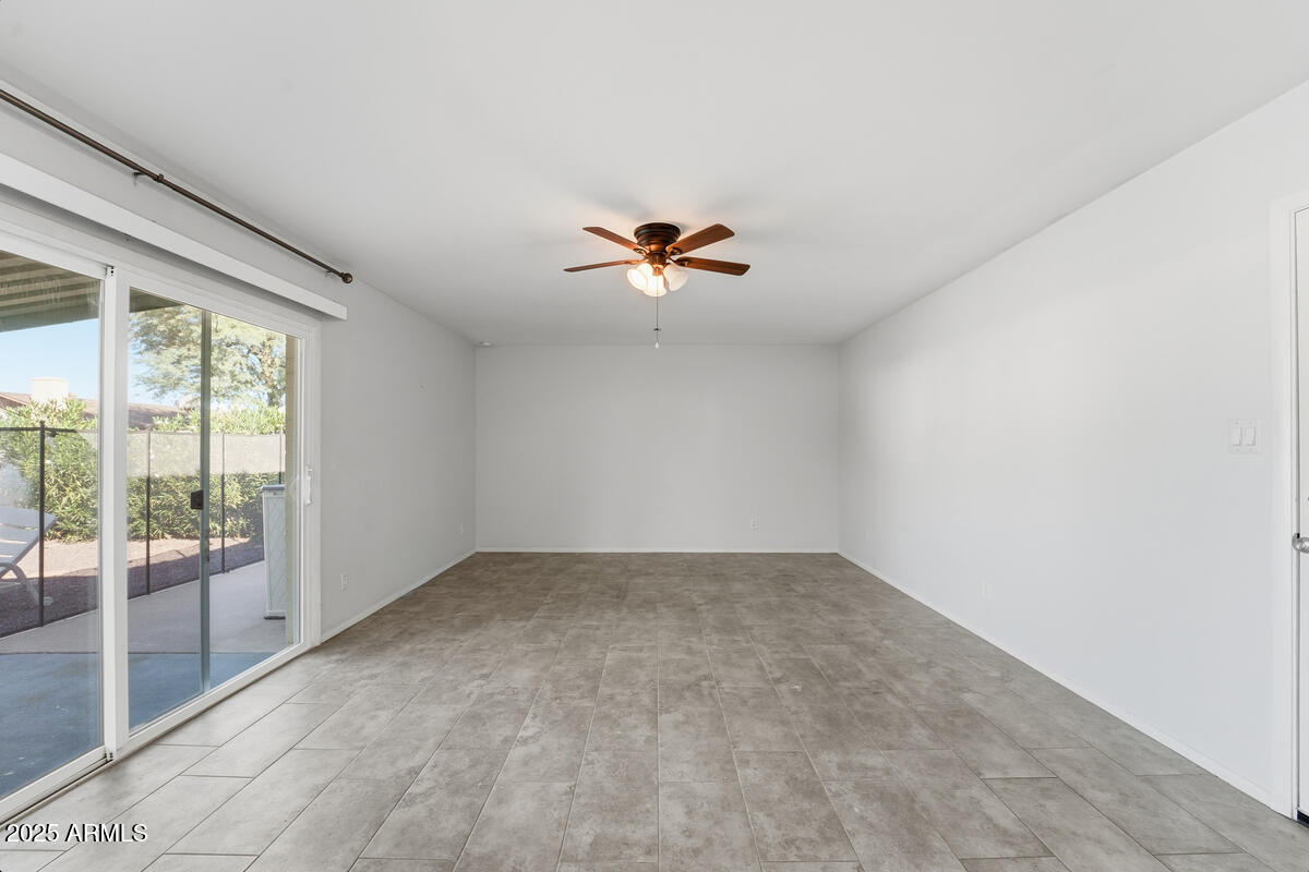 1644 East Broadmor Drive Tempe, AZ 85282 - Photo 27 of 49 an empty room with fan
