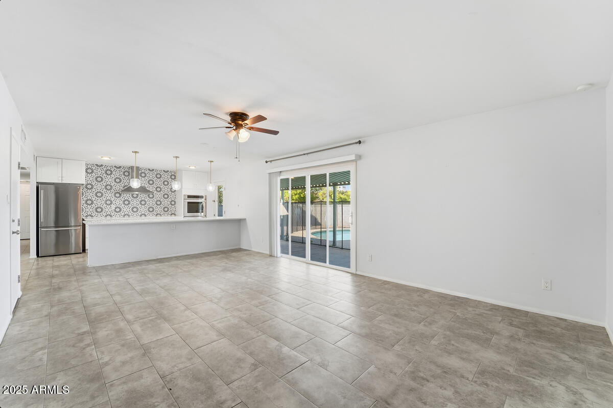 1644 East Broadmor Drive Tempe, AZ 85282 - Photo 28 of 49 a view of an empty room with a window
