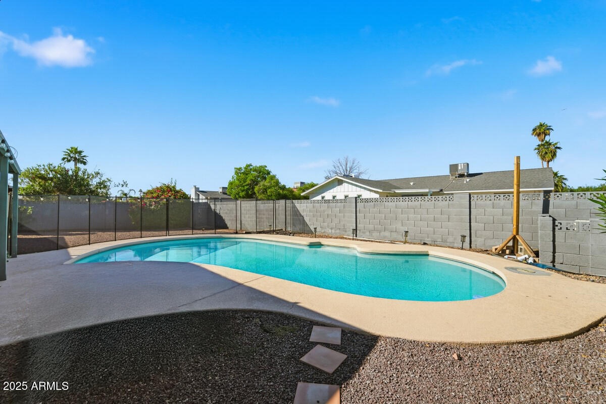 1644 East Broadmor Drive Tempe, AZ 85282 - Photo 46 of 49 a view of a backyard with swimming pool