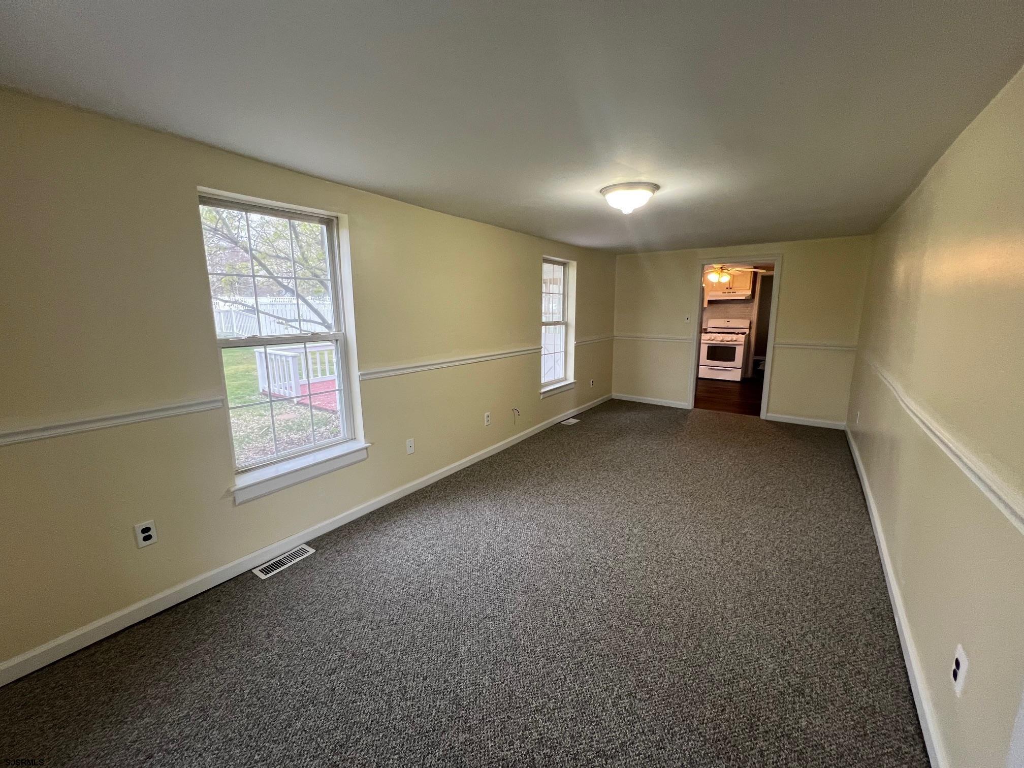 219 Pleasant Mills Road Hammonton, NJ 08037 - Photo 3 of 14 an empty room with windows