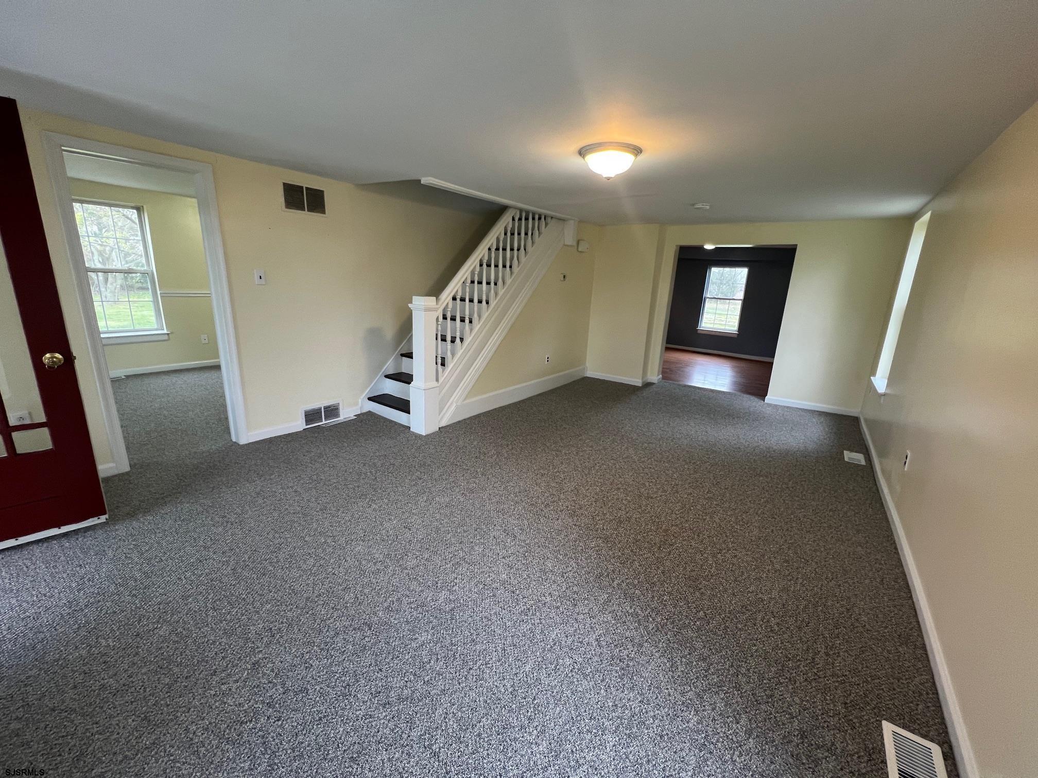 219 Pleasant Mills Road Hammonton, NJ 08037 - Photo 5 of 14 a view of an empty room with closet and stairs