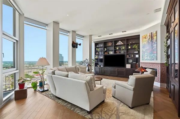a living room with furniture or couch and a book shelf
