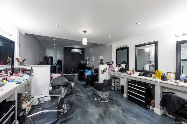 a room with gym equipment and a large window