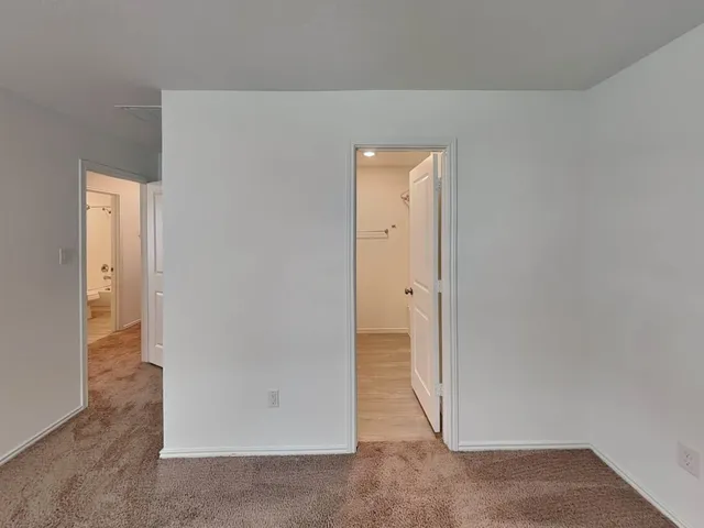an empty room with closet