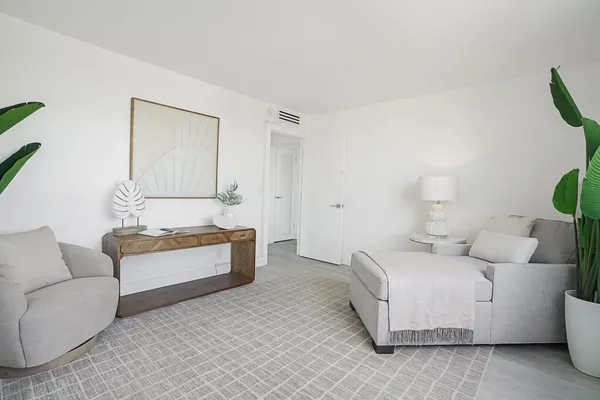 a living room with furniture and a couch