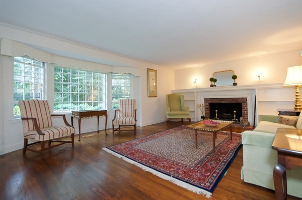 20 Saddle Club Road Lexington, MA 02420 - Photo 4 of 14 a living room with furniture and a fireplace