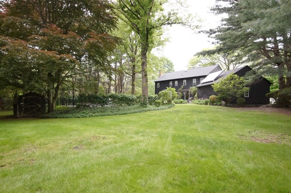 20 Saddle Club Road Lexington, MA 02420 - Photo 10 of 14 a view of a house with a big yard