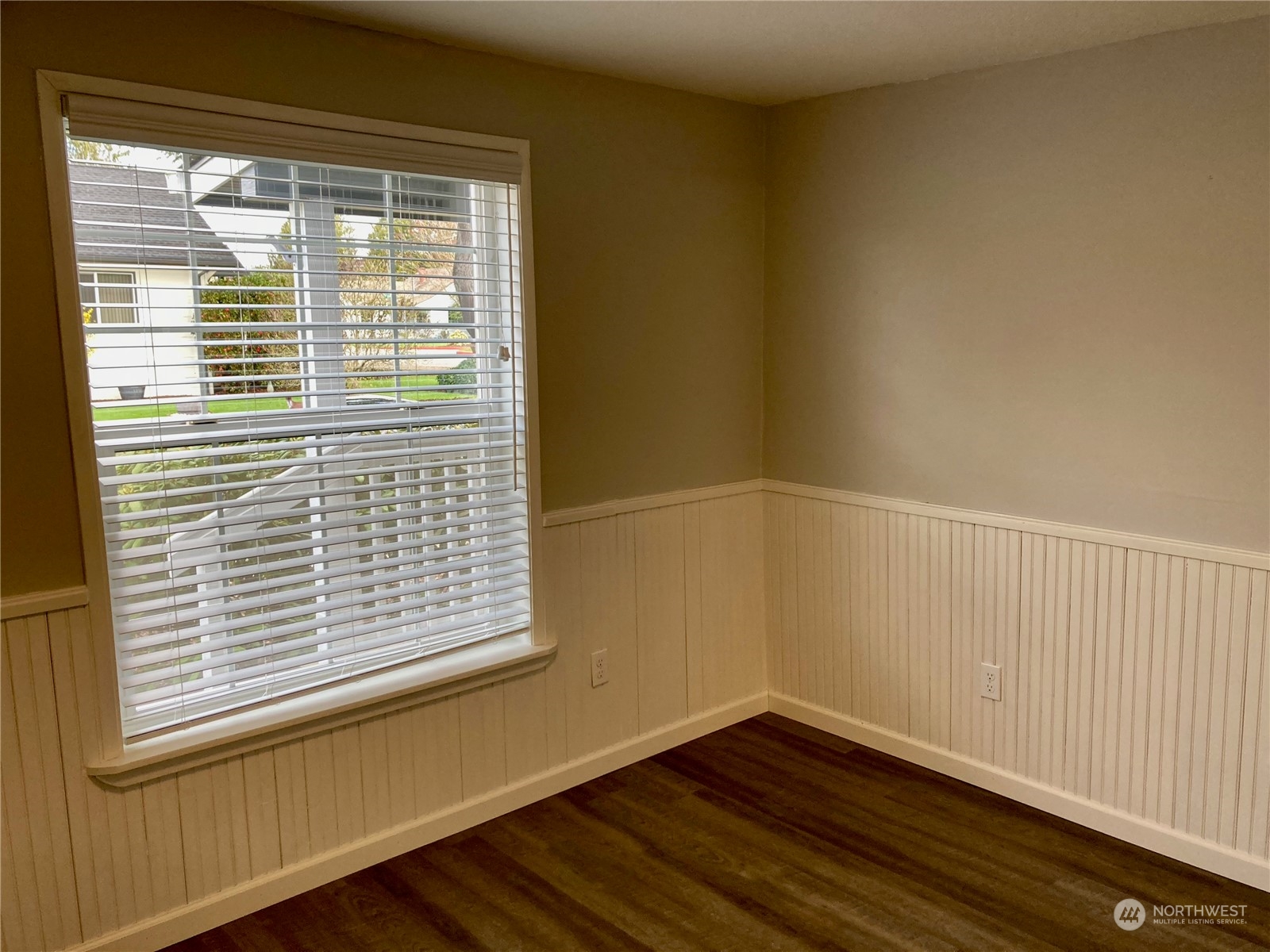 522 Centre Street La Conner, WA 98257 - Photo 23 of 30 a view of a small space with wooden floor and a window