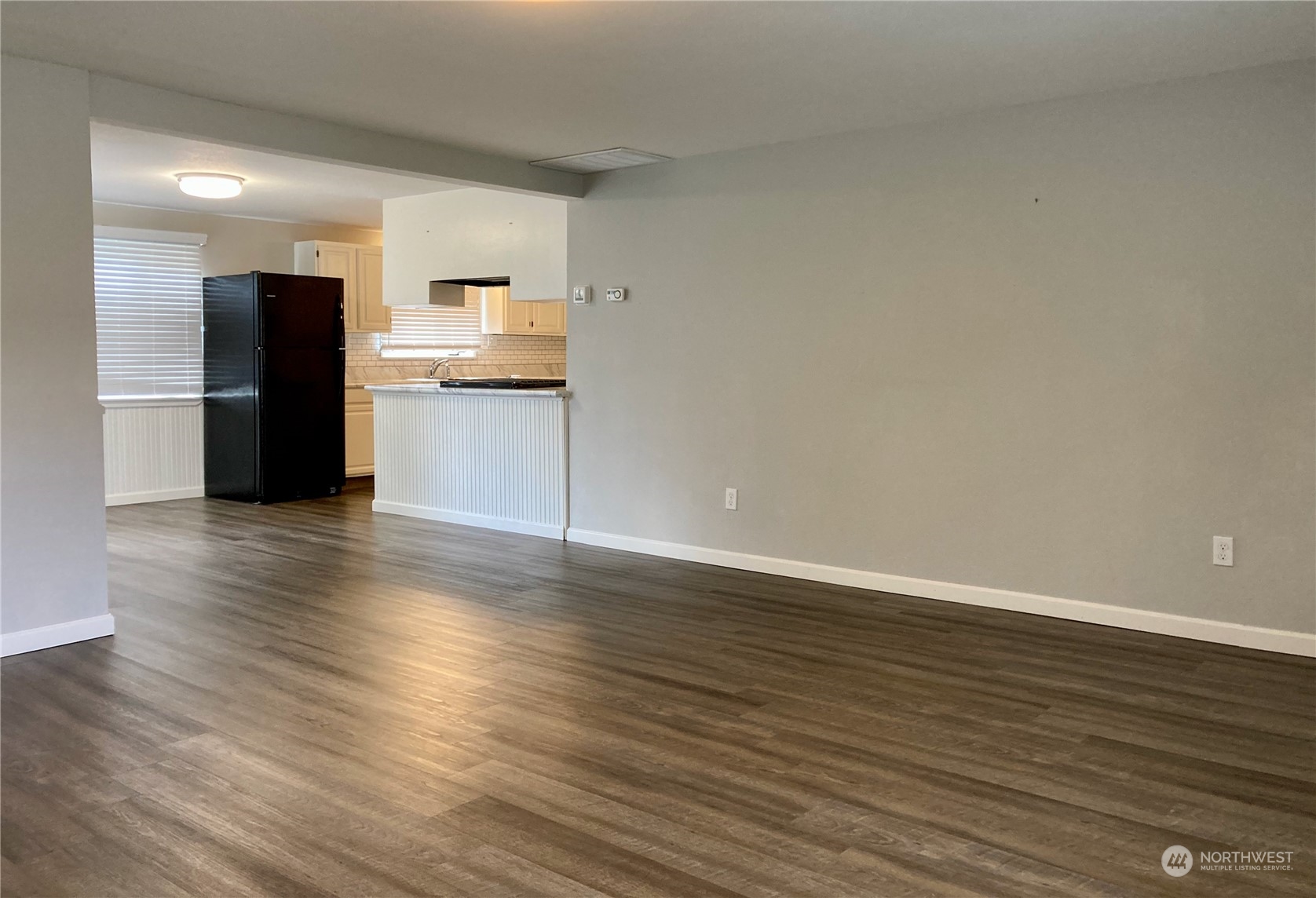 522 Centre Street La Conner, WA 98257 - Photo 5 of 30 a view of kitchen view wooden floor and electronic appliances