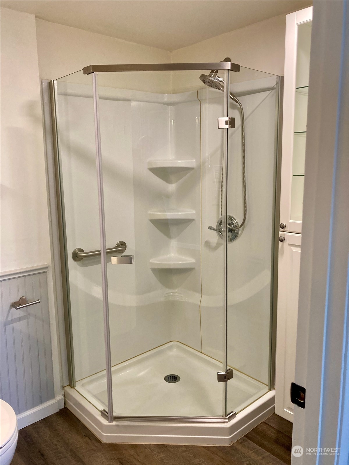 522 Centre Street La Conner, WA 98257 - Photo 8 of 30 a bathroom that has a glass shower door