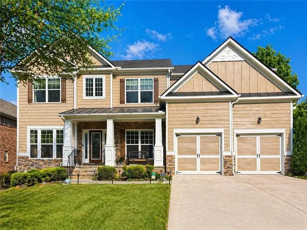 front view of a house with a yard