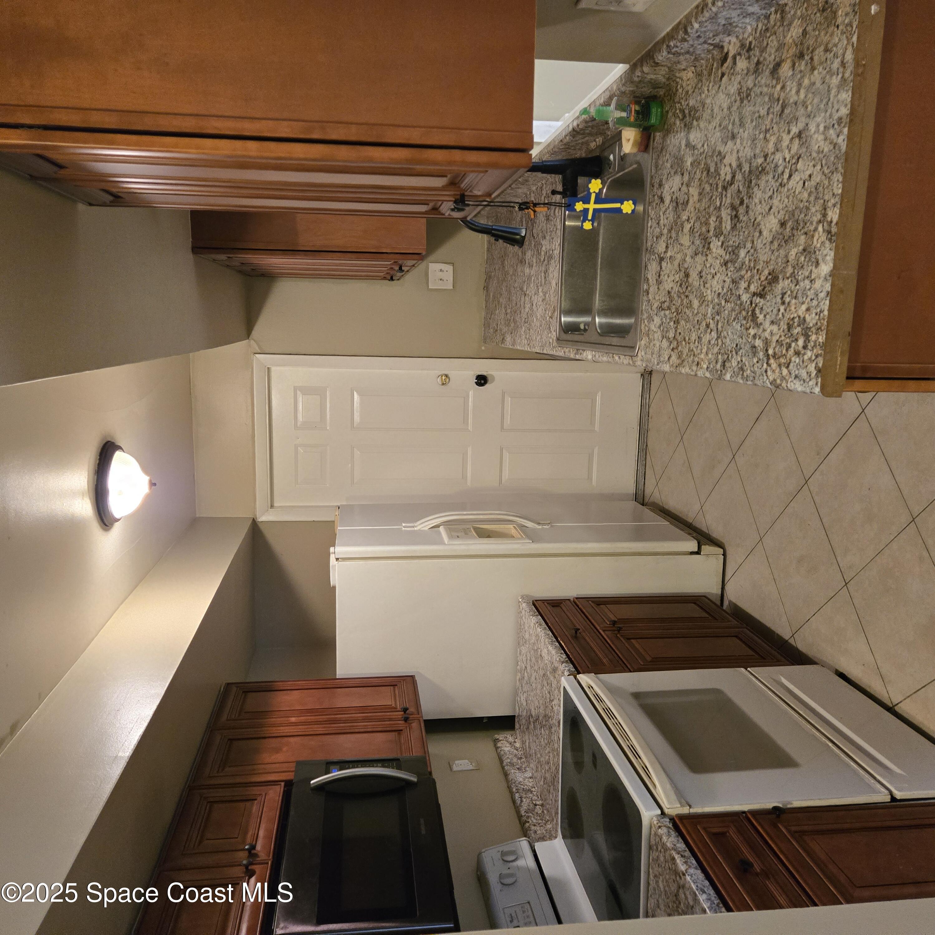 349 El Rancho Terrace Northeast Palm Bay, FL 32907 - Photo 7 of 9