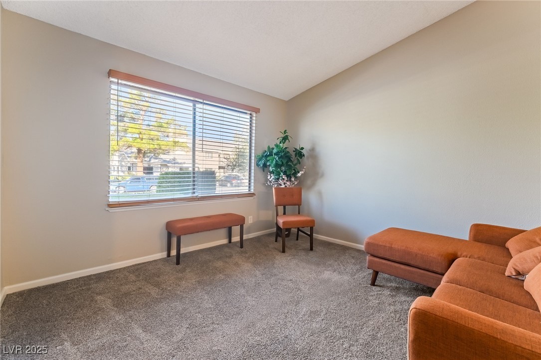 2755 Carnation Lane Henderson, NV 89074 - Photo 4 of 42 Living area featuring lofted ceiling
